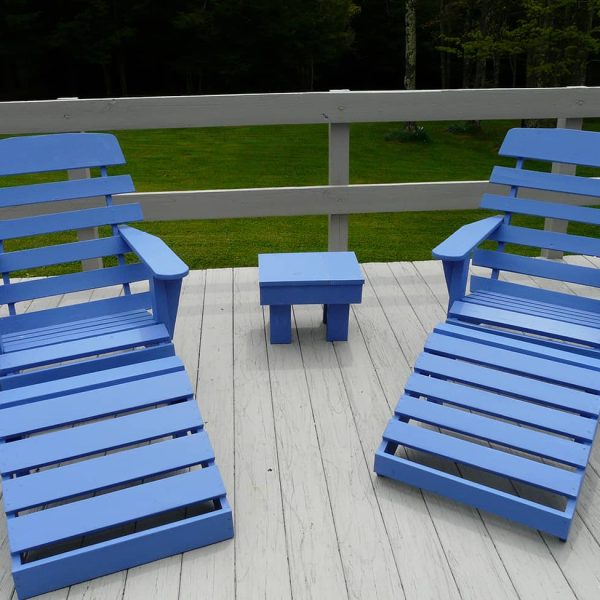 deck with blue patio furniture